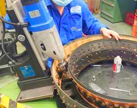 Engineer inspecting aero engine