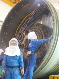 Engineer inspecting aero engine